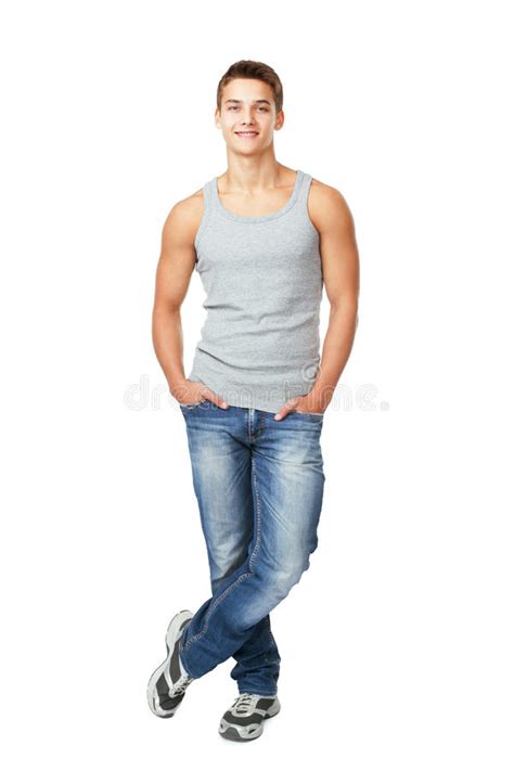 Smiling Young Man Standing With Hands In Pockets Stock Image Image Of