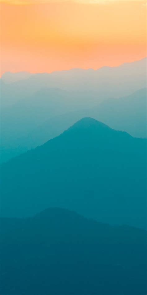 Mountains Foggy Mist Sunrise Turquoise Yellow Sky Gradient