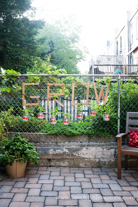 Chain link is the most popular fence, mainly used around the united states. Chic on the Cheap: Chain Link Fence Basil Garden ...