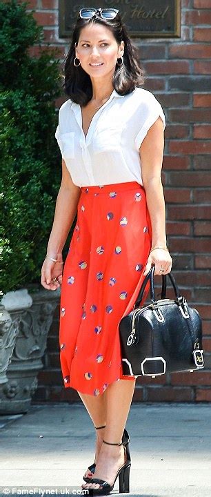 Olivia Munn Is Prim And Proper In A Conservative Blouse And Long Skirt