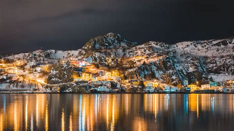 Download Wallpaper 3840x2160 Mountains Lake Village Night Light Snow 4k Uhd 169 Hd Background