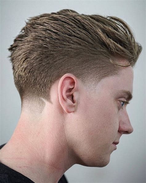 Originally worn in the 40s and 50s in the us military, and continued in black and hispanic barbershops, the fade really got elevated into popular culture in the 90s with. 25+ Low Fade Haircuts For Stylish Guys -> May 2021 Update