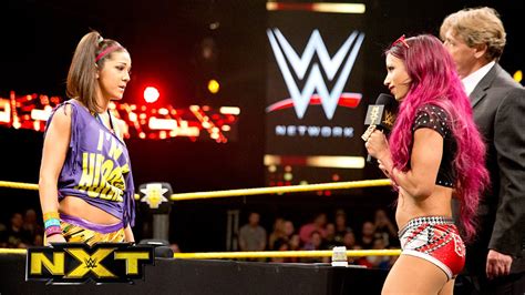 Sasha Banks Bayley Sign The Contract For Their Nxt Womens Title