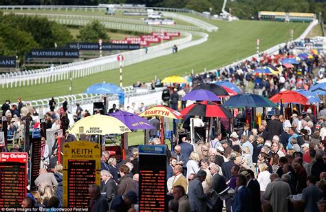 Glorious Goodwood Racegoers Brave Dismal Weather As Races Get Underway