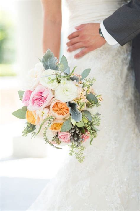 Muted shades like mauve, butter yellow, cream, and green are an unexpected but stunning option purple fall wedding bouquet with succulents. Pink, Peach, and Ivory Bouquet www ...