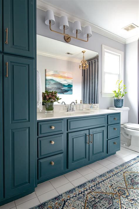 This master bathroom vanity space has been a work in progress for six months, in it i repurposed the existing cabinet and designed around it, but the wow factor comes from this new diamond pattern backsplash tile. Plan your Bathroom Makeover Online #luxurybathroomonline ...