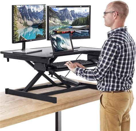 Consider a height adjustable desk or fixed height stand up desk for a more permanent setup. FDW Adjustable Height 32 Inches Steel Standing Desk ...
