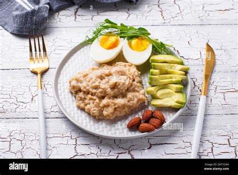 Healthy Balanced Breakfast In Plate Stock Photo Alamy