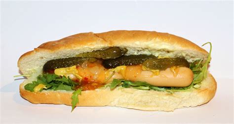 Sausage On Bun With Condiments Image Free Stock Photo Public Domain