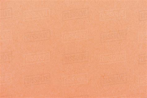 Texture Of Peach Orange Color Paper As Background Stock Photo Dissolve