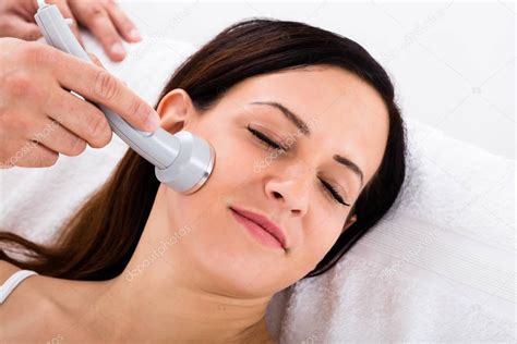 Woman Receiving Face Massage Stock Photo By ©andreypopov 129363568