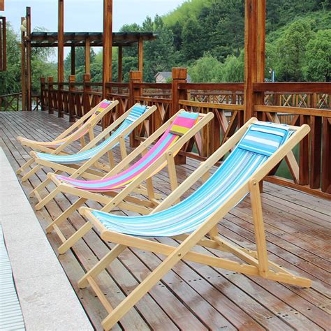 Choose from the startling variety of. Simple folding portable leisure beach chair wood canvas ...