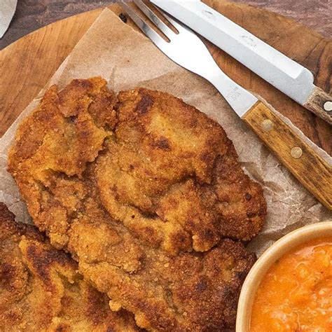 Crumbed Beef Schnitzel With Roasted Tomato And Capsicum Sauce