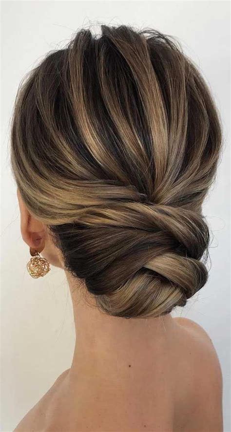 If you hair is too short to achieve this low bun on its own, you can easily braid in added hair to pull off the look. wedding updos for medium length hair,wedding updos,updo ...