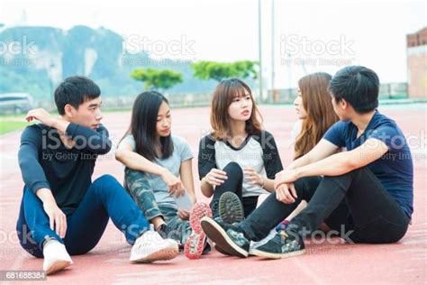 Group Of Happy Teen High School Students Outdoors Stock Photo