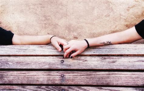 Two People Holding Hands On Bench Stock Photo By ©graphicphoto 53620575