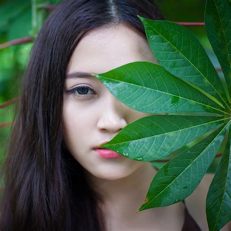portrait of vietnamese women and leaf photograph by huynh thu fine art america