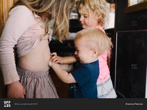 Kids Touching Girls Bare Belly Stock Photo Offset