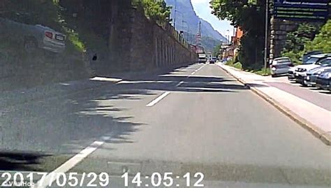 Moment A Runaway Car Flies Backwards Down Hill In Slovenia Daily Mail Online