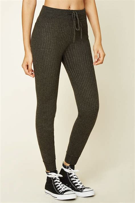 A Pair Of Ribbed Sweater Knit Leggings Featuring An Elasticized Drawstring Waist A Back Patch
