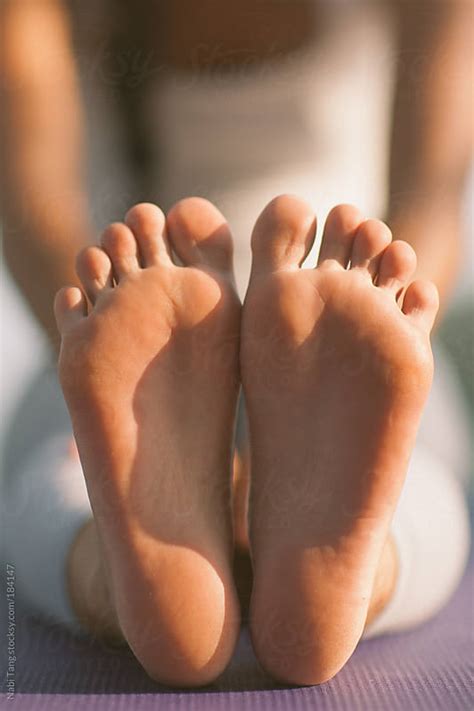 Woman Doing Yoga Closeup Of Her Bare Feet By Nabi Tang Stocksy United