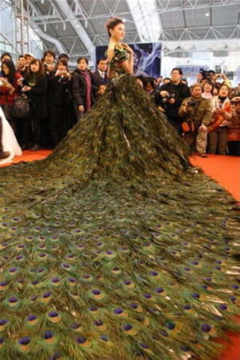 A Dress Made Entirely Out Of Peacock Feathers Say What Now