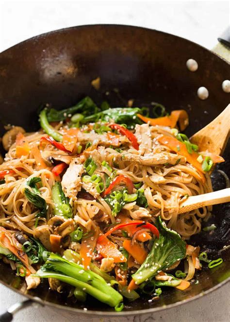 Add cooked egg noodles and seasonings (a). Chicken Stir Fry with Rice Noodles | RecipeTin Eats