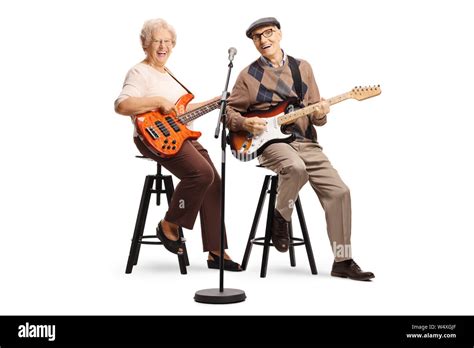 Mature Couple Sitting On Rock Cut Out Stock Images And Pictures Alamy