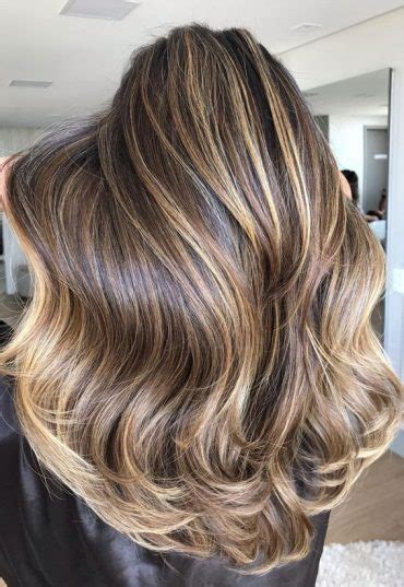 best hair colour ideas and styles to try in 2021 brown with golden highlights