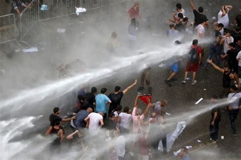 Lebanon Police Uses Gunfire Tear Gas Water Cannons To Fights You