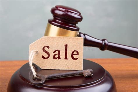 Real Estate Sale Auction Concept Gavel And Key On The Wooden Table