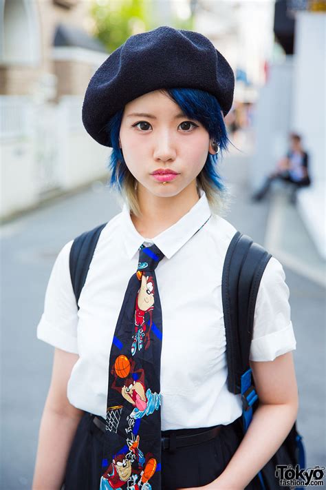 20 Year Old Shoppy On The Street In Harajuku With Blue Hair Piercings And A Looney Tunes