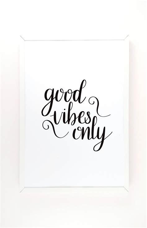 A Black And White Print With The Words Good Vibes Only In Cursive Writing