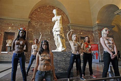 Topless Protest At The Louvre Half Naked Femen Campaigners In Paris