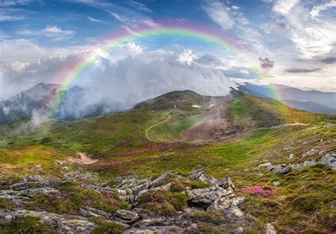 Mountain Landscape With Rainbow And Nature Stock Photos Creative Market