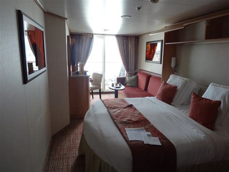 Bed, desk, closet, shelves, and a small bathroom. Best Cruise Ships for Cabins: 2019 Cruisers' Choice Awards ...
