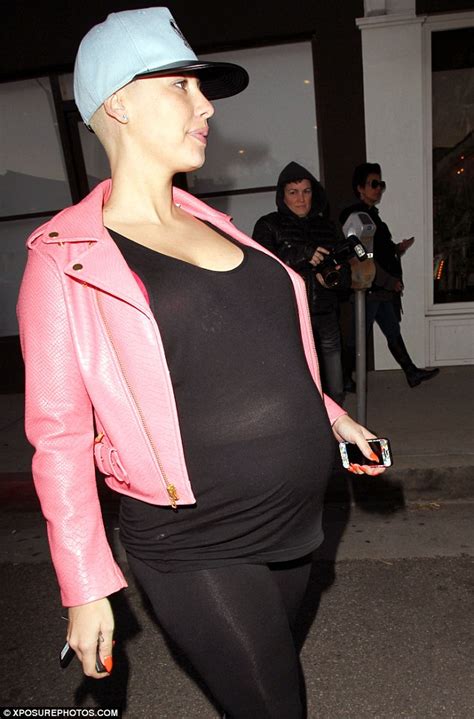 Blossoming Amber Rose Proudly Showed Off Her Huge Baby Bump In