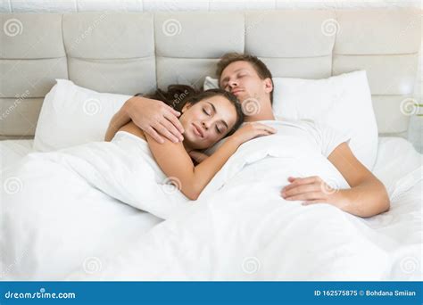 Lovely Couple In Bed Lying In Bedroom Endinspire