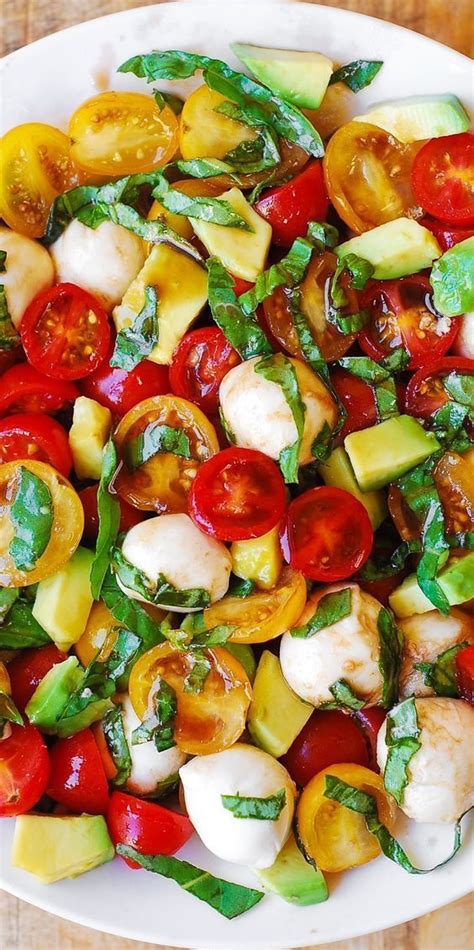 Slice the tomatoes and arrange them on a salad platter or on individual serving plates. Tomato Basil Avocado Mozzarella Salad with Balsamic ...