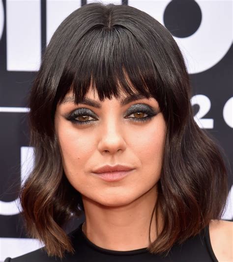 Mila Kunis Debuts Dramatic Dark Fringe On The Billboard Music Awards