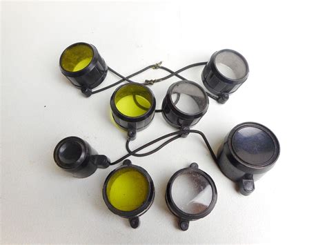 ASSORTED LOT OF SCOPE LENS CAPS