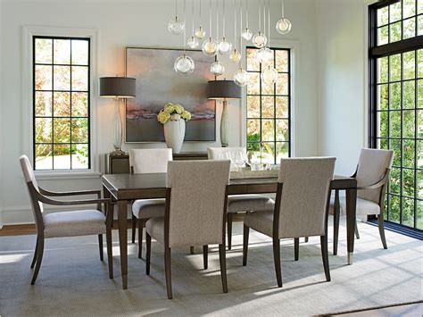 It has gray chairs and a lovely chandelier. Lexington - Ariana Chateau Extendable Rectangular Dining Table In Rich Gray Finish - 01-0732-877