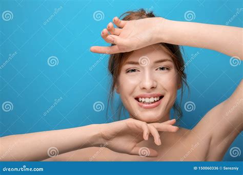 Beautiful Young Woman With Silky Skin On Color Background Stock Photo