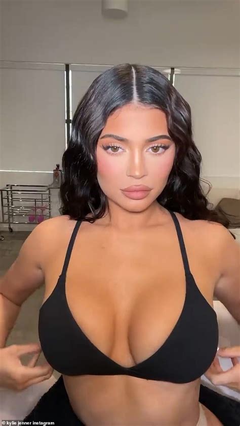 Kylie Jenner Shows Off Her Cleavage In A Bikini Top While Getting Her Hair Styled Daily Mail