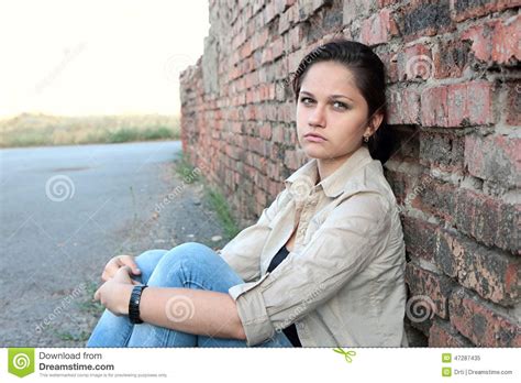 Sad Young Girl Near An Brick Wall Stock Image Image Of Anguish