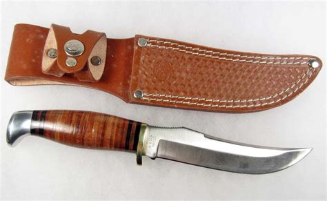 Colt Clip Point Hunting Knife W Stacked Leather Handle And Sheath