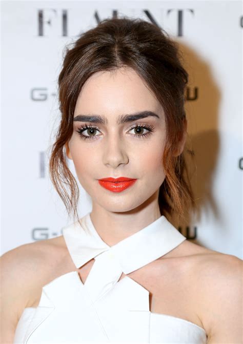 11 Of Lily Collins Best Beauty Looks Bright Orange Lips And A Neutral