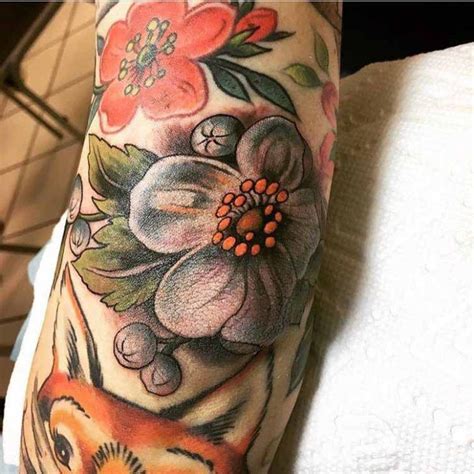 Flower Tattoo On Elbow Realistic Style Elbow Tattoos Cool Tattoos