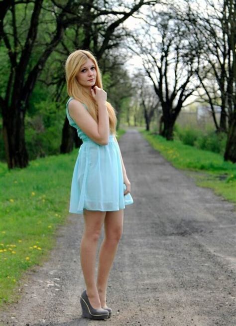 Cute Blonde Girl In Light Dress And Wedges Outdoor Kar0