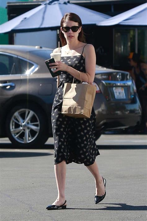 Emma Roberts Wears A Floral Print Black Dress As She Steps Out To Grab Lunch In Los Feliz